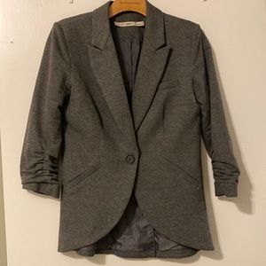 Cute gray 3/4 sleeve blazer. Can be dressed up or down.